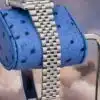 Rolex Datejust 41 Jubilee bracelet full length draped over blue pillow on display stand showing Oysterclasp