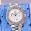 Omega Speedmaster Racing bracelet full view draped over blue pillow on display stand showing brushed and polished link finishing
