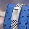Rolex Datejust 41 126300 Jubilee bracelet and Rolex crown clasp detail on blue ostrich pillow